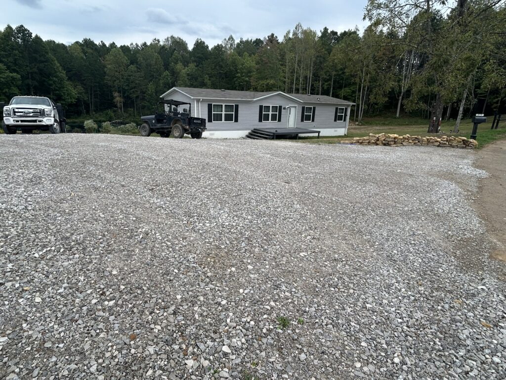 Front view of gravel yard and basecamp rental near Wildcat Off-Road Park